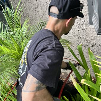 Best Coast technician clearing a main line from the outdoor cleanout