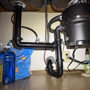 New drain, trap and garbage disposal hookup under a kitchen sink