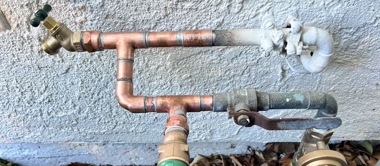 New copper water line and pressure regulator installed by Best Coast Plumbing