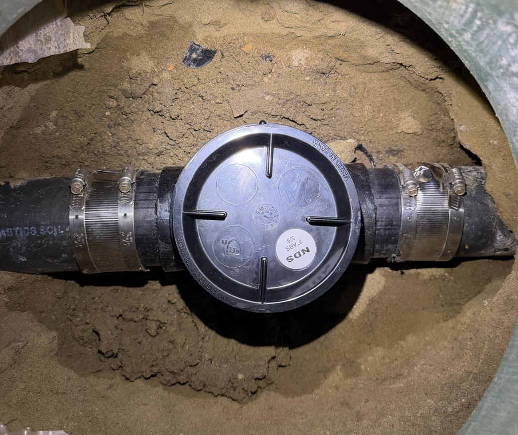 New backwater check valve installed in a sewer line at a Westlake Village home by Best Coast Plumbing